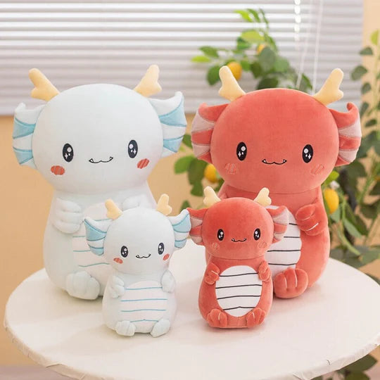 Kawaii axolotls plushies sitting together