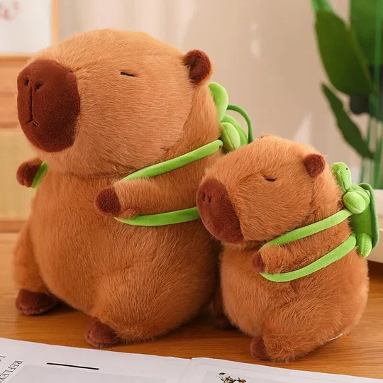 Two Capybaras plushies chilling eyes closed