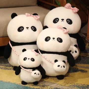 Four panda plushies together