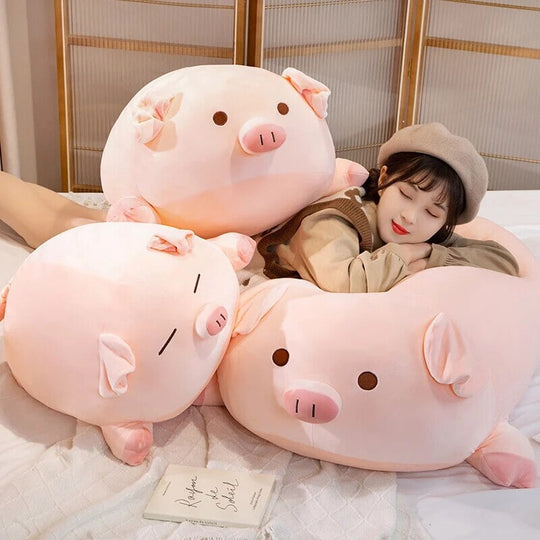 Three plushies pigs