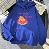 Capybara Floating Donut Don't Worry Be Cappy Unisex Hoodies-Enchanted peach