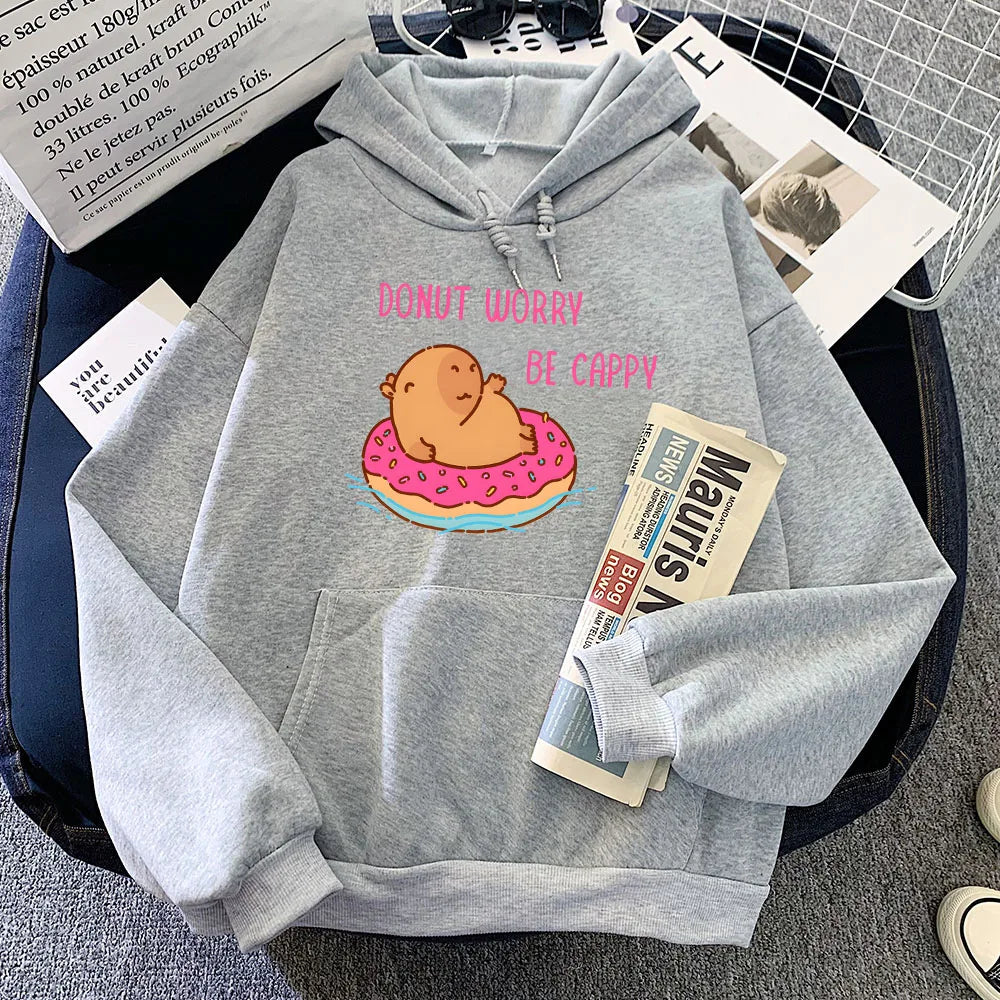 Capybara Floating Donut Don't Worry Be Cappy Unisex Hoodies-Enchanted peach