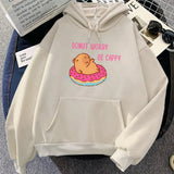 Capybara Floating Donut Don't Worry Be Cappy Unisex Hoodies-Enchanted peach