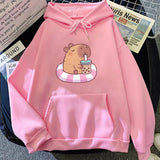 Capybara Floating & Sipping Bubble Tea Unisex Hoodie-Enchanted peach