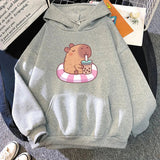 Capybara Floating & Sipping Bubble Tea Unisex Hoodie-Enchanted peach