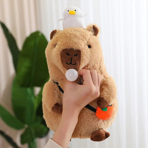 Fluffy Sleepy Capybara with Orange Plushie-Enchanted peach