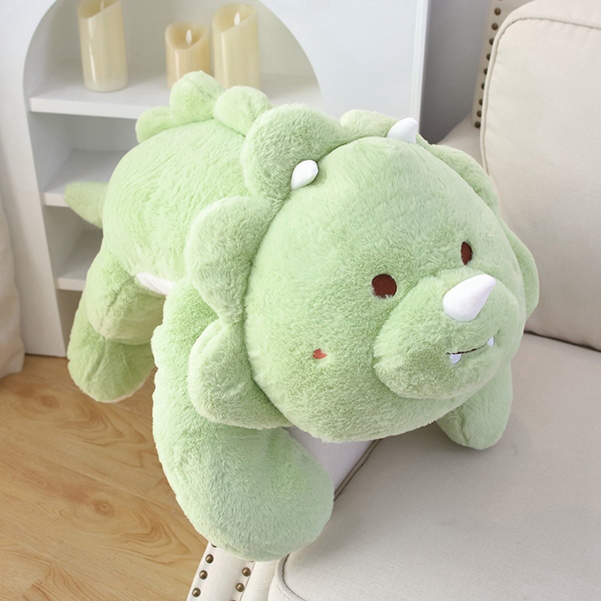 Laying Triceratops Plushie-Enchanted peach