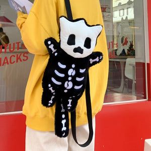 Whisper the Mini Skeleton Plush Backpack-Enchanted peach