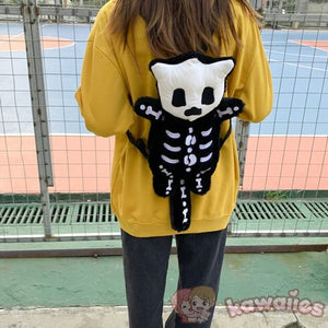 Whisper the Mini Skeleton Plush Backpack-Enchanted peach