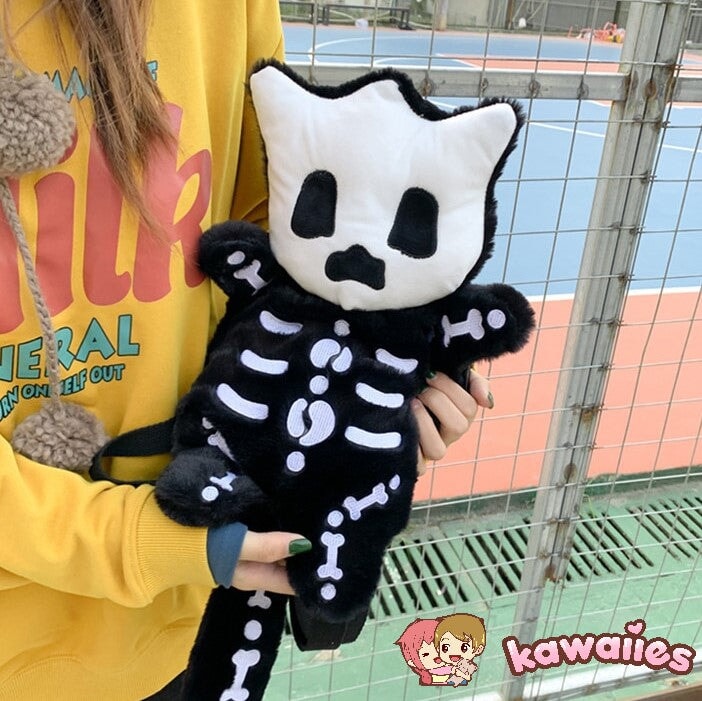 Whisper the Mini Skeleton Plush Backpack-Enchanted peach