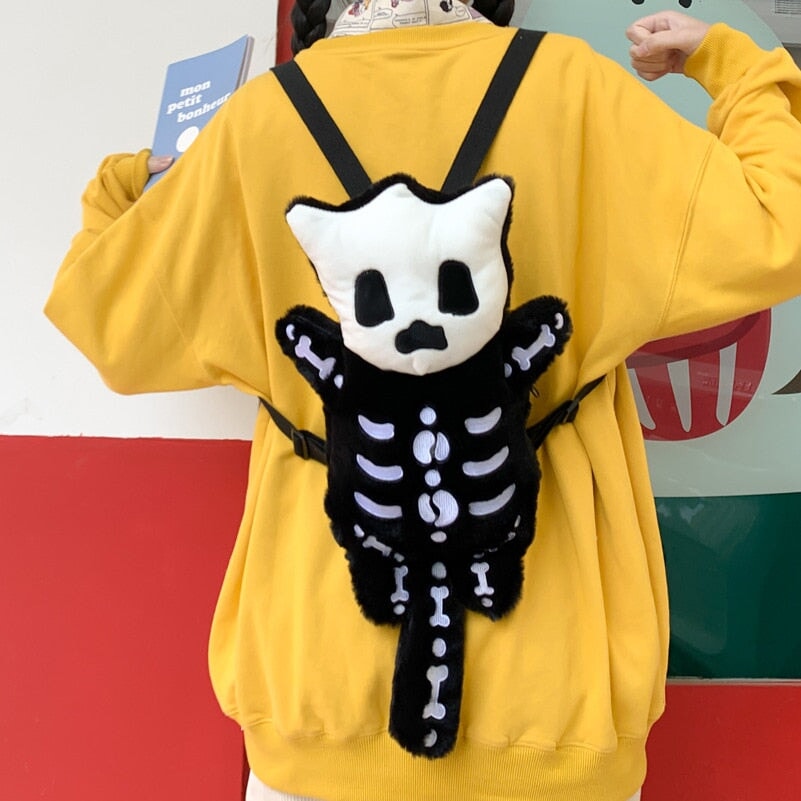 Whisper the Mini Skeleton Plush Backpack-Enchanted peach